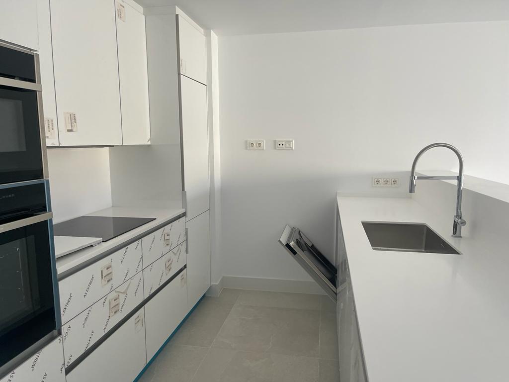 Low with height of three bedrooms, two bathrooms with private garden