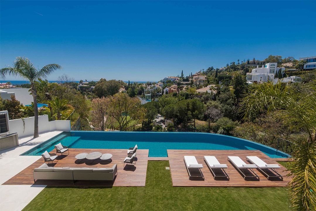 New modern villa with stunning panoramic sea and golf views.