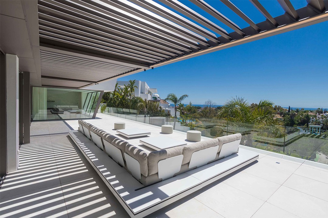 New modern villa with stunning panoramic sea and golf views.