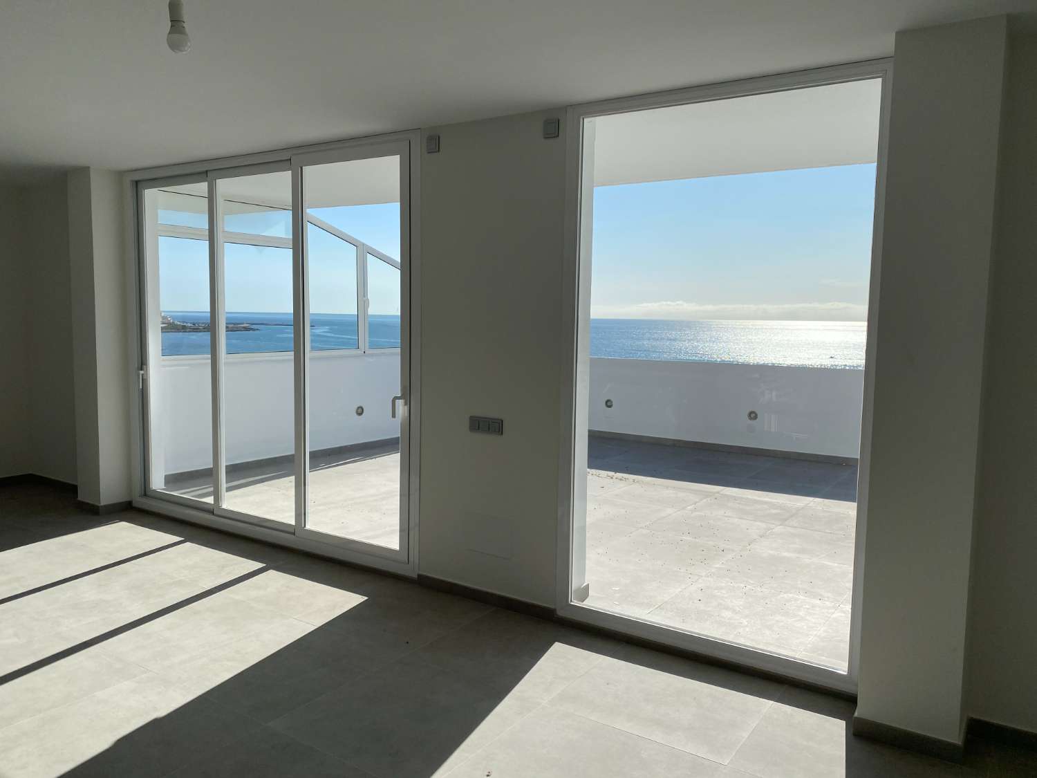 Fantastic south facing 3 bedroom duplex penthouse on the beachfront.